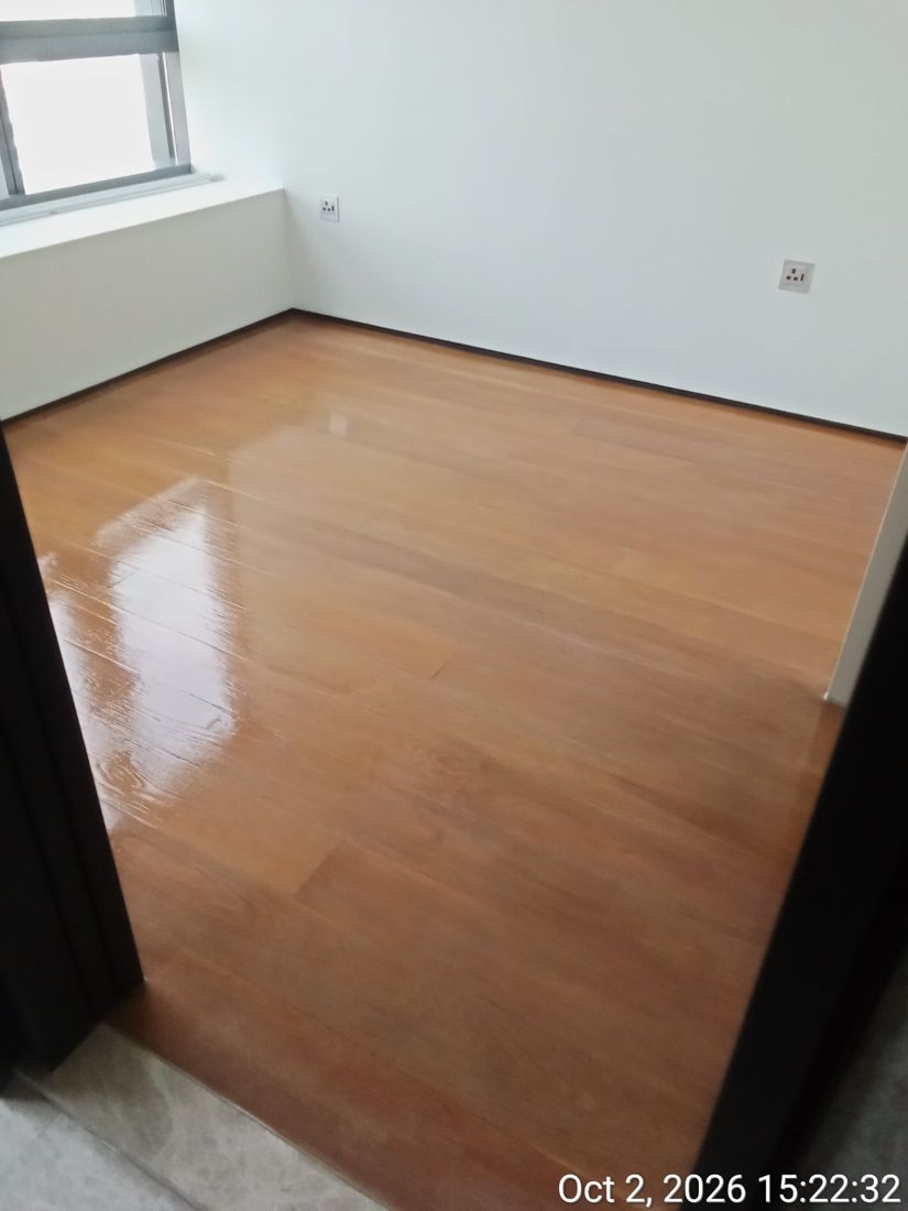 Varnished strip parquet bedroom corner