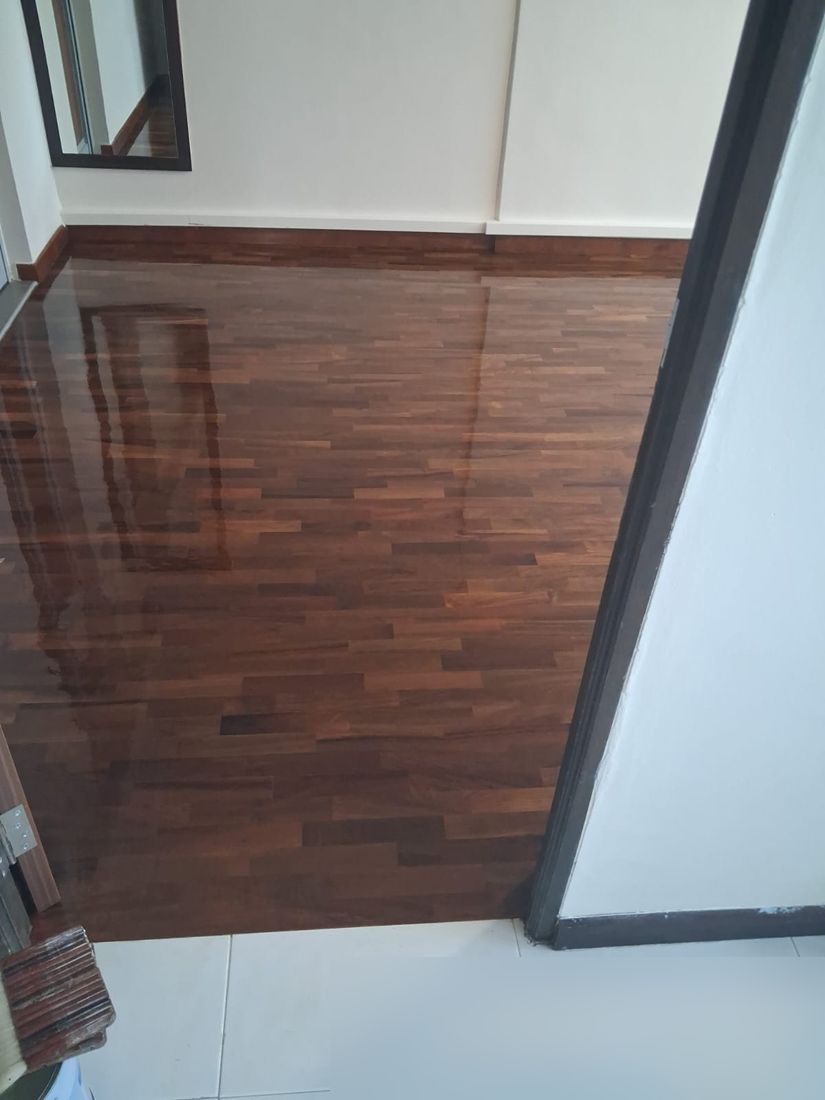 Varnished dark parquet in a bedroom