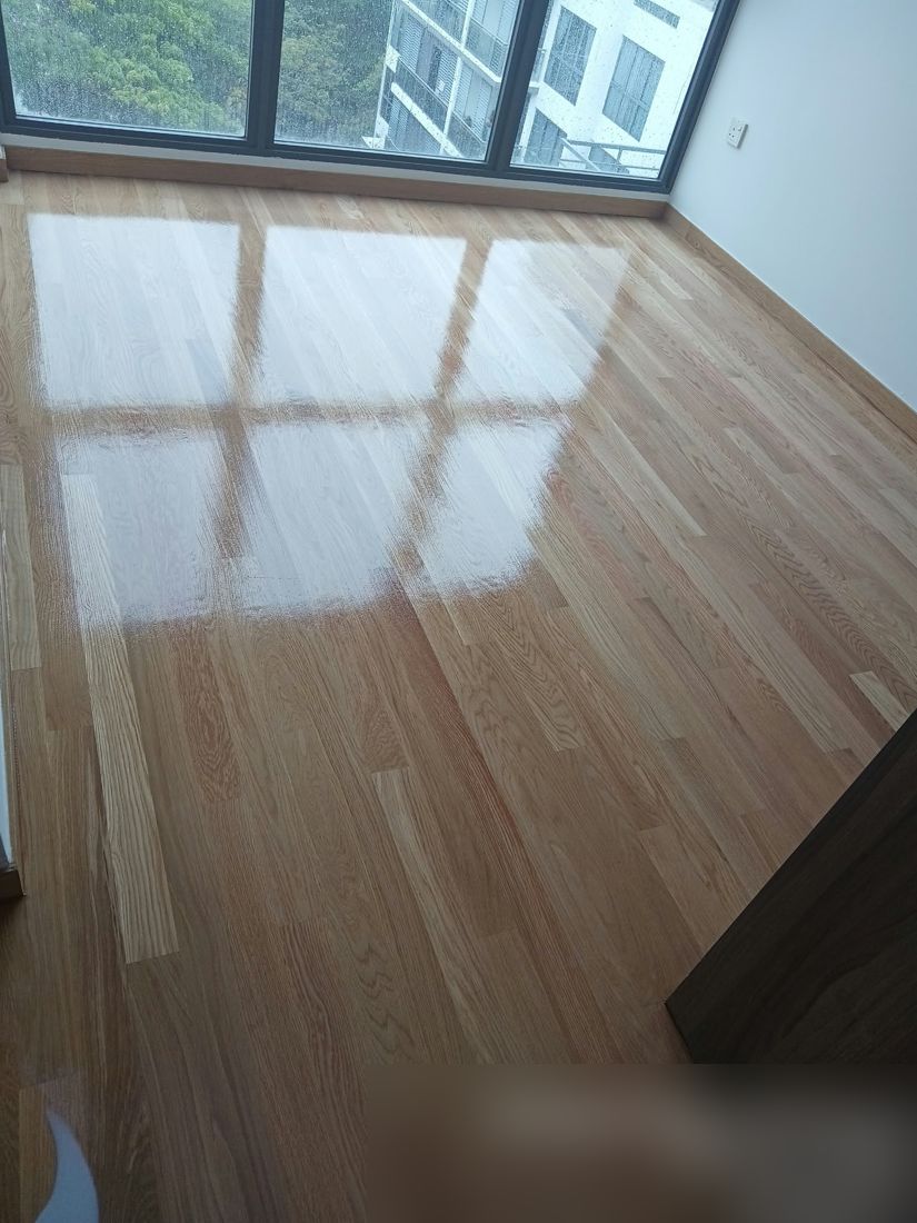 Light oak strip floor after clear gloss varnish