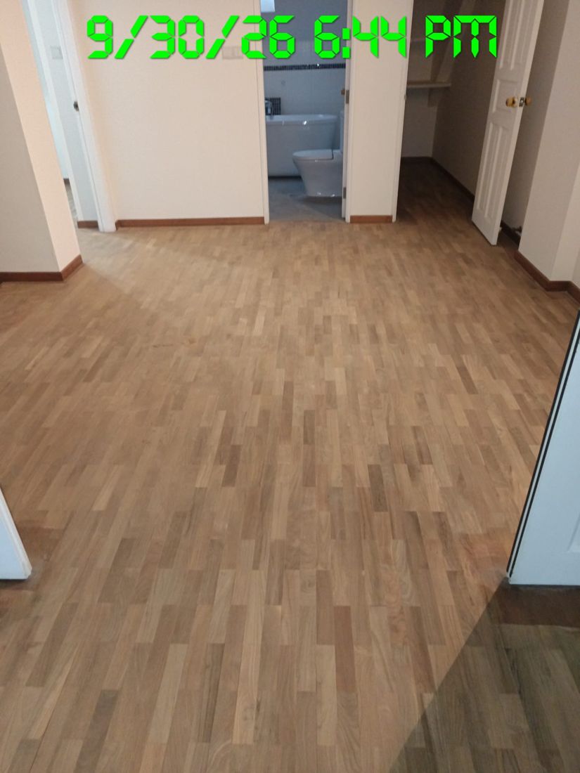 Natural-tone parquet bedroom after sanding and sealing