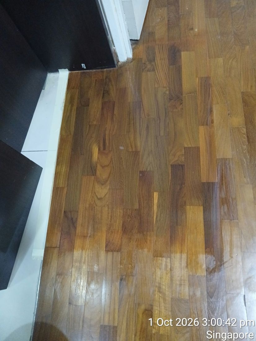 Repaired strip parquet next to cabinets after varnish