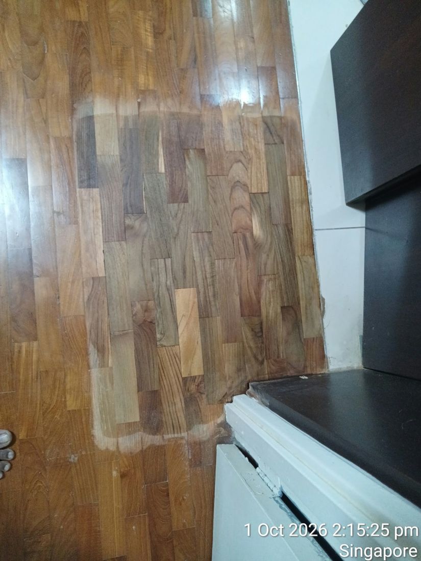 Relaid parquet pieces sanded flush with the floor