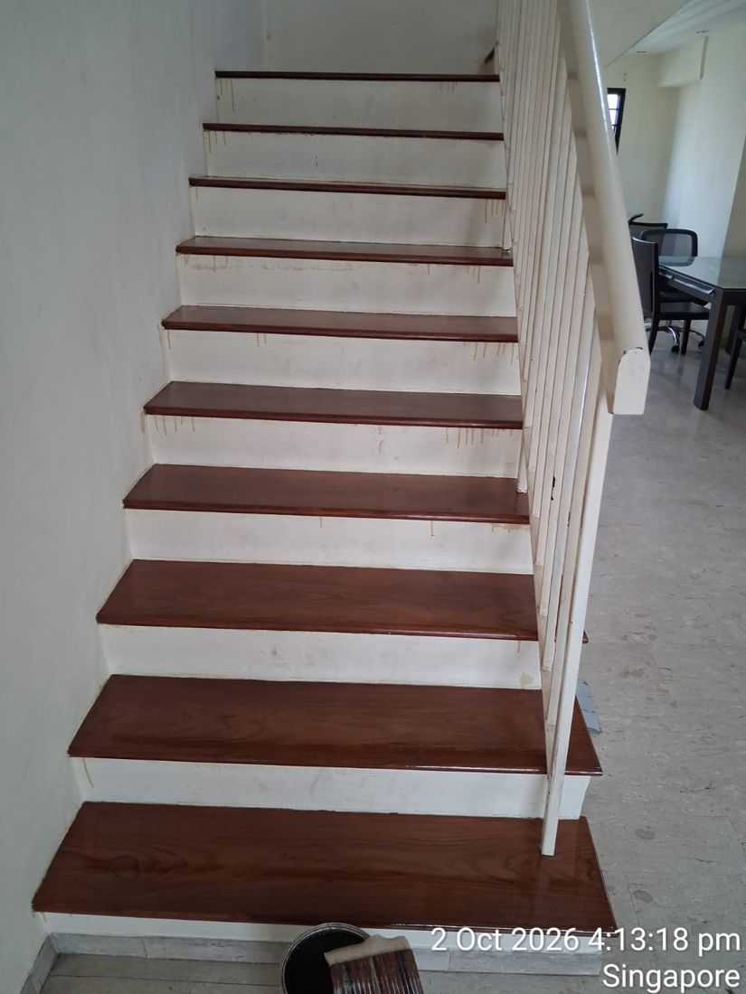 Dark-stained timber treads with white risers
